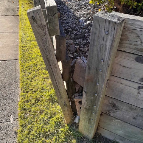 Failed timber retaining wall